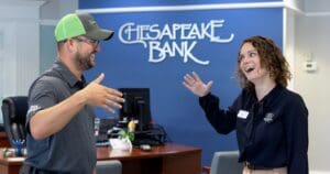 Chesapeake Bank Business Relationship Officer shaking hands with a Williamsburg business owner